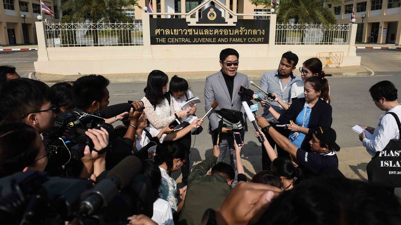 Thai lawyer Kong Suriyamontol speaks to the press after his client was granted paternity rights to his 13 children. 
