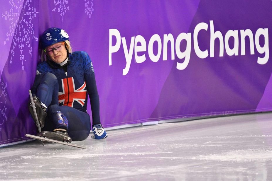 British speedskater Elise Christie falls during a 1,000-meter short-track race.