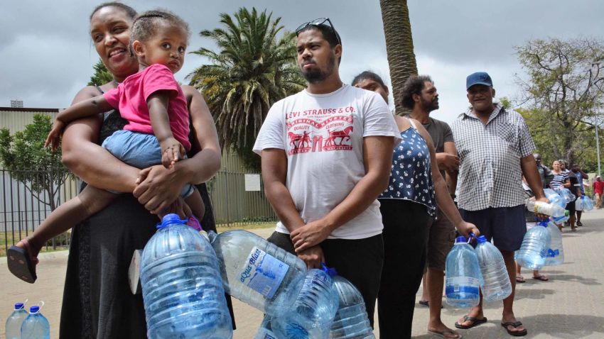 People wait in line for water in Cape Town on Feb. 16, 2018. In June, the South African city is expected to become the first major world city to completely run out of water, according to media reports. (Photo by Kyodo News/Sipa USA)