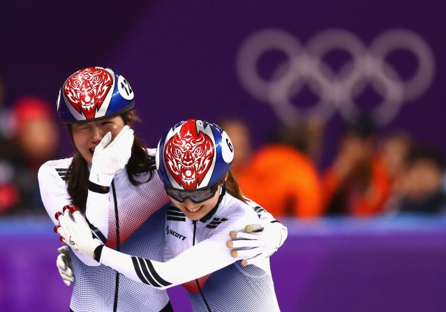 Short-track speedskaters Kim A-lang, left, and Choi Min-jeong celebrate after South Korea won gold in the 3,000-meter relay.