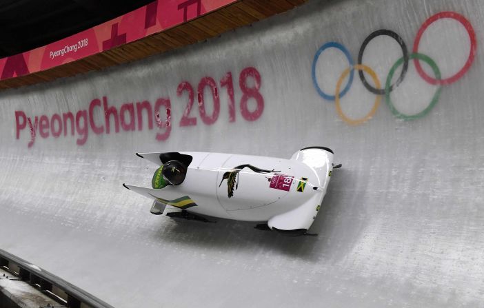 Jamaican bobsledders Jazmine Fenlator-Victorian and Carrie Russell make their first run down the course.
