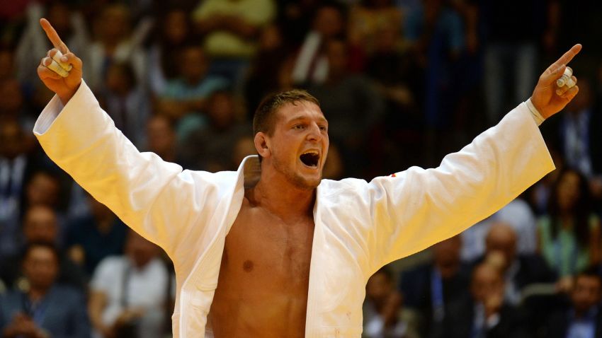 Czech Republic's Lukas Krpalek celebrates after winning the gold medal against Cuba's Jose Armenteros during the -100 kg category competition at the World Judo Championships on in Chelyabinsk,on August 30, 2014. AFP PHOTO / VASILY MAXIMOV        (Photo credit should read VASILY MAXIMOV/AFP/Getty Images)