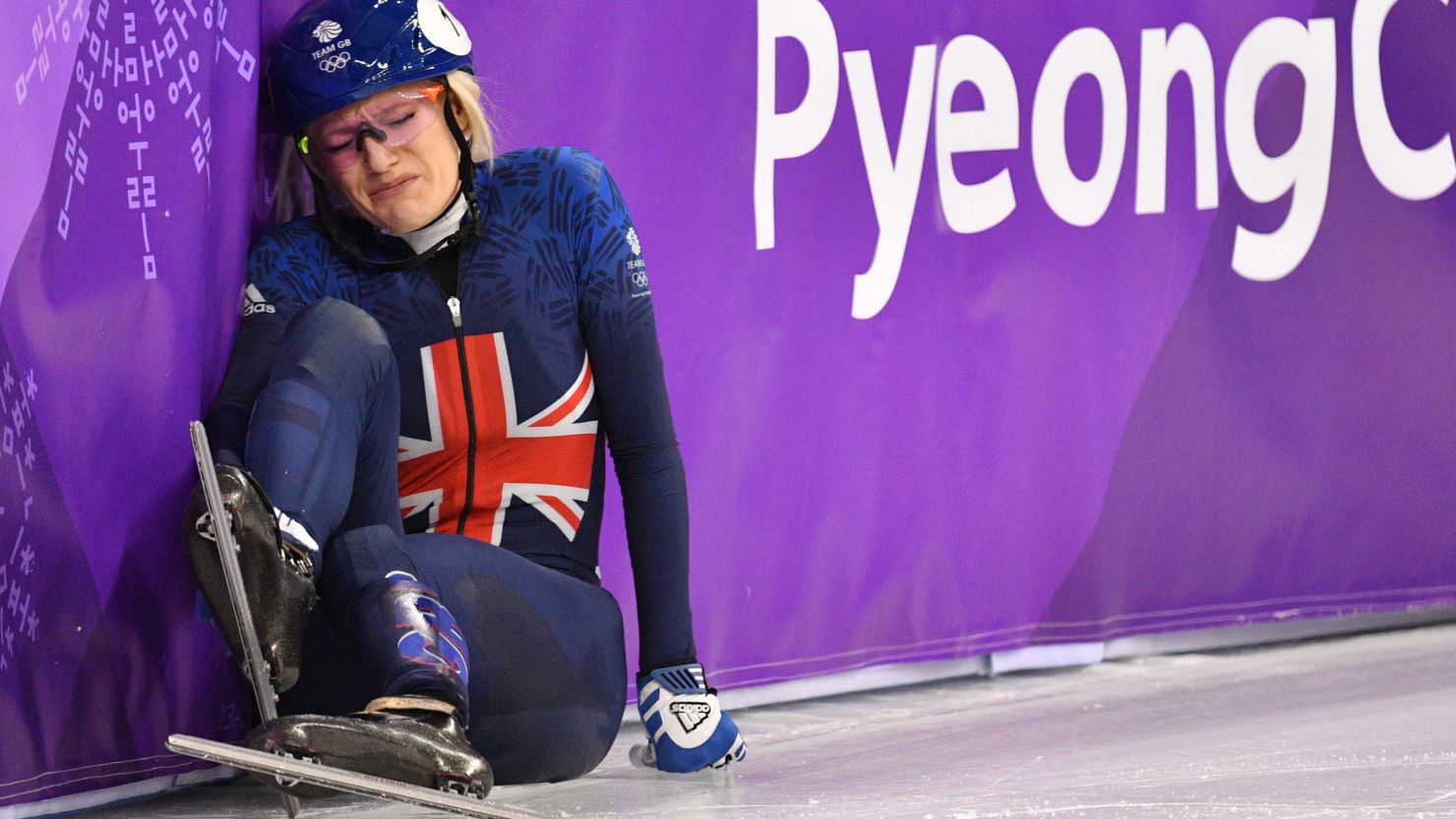 A dejected Elise Christie after crashing at the start of her heat Tuesday.