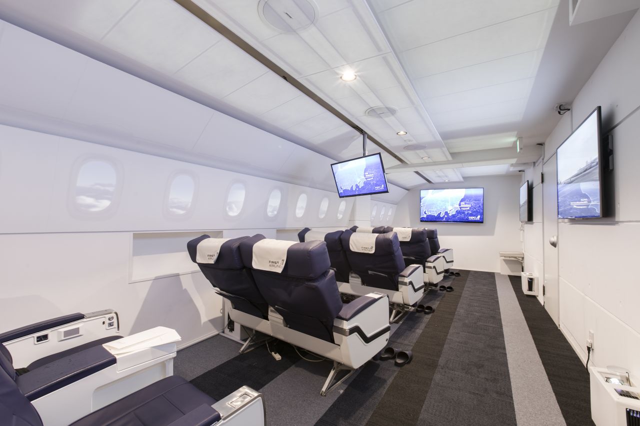 <strong>Personal service:</strong> The cabin can accommodate 12 people -- there are eight first-class seats and four business-class seats per flight.