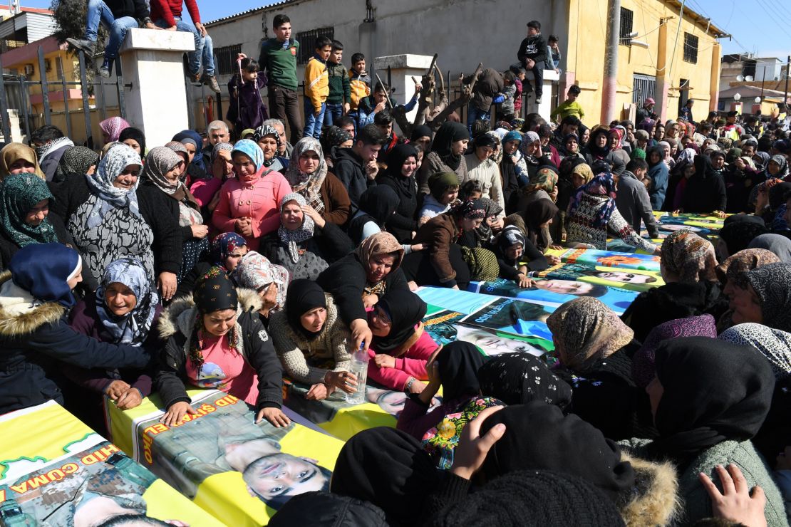 Syrian Kurds attend a funeral in Afrin in mid-February for Kurdish fighters. 