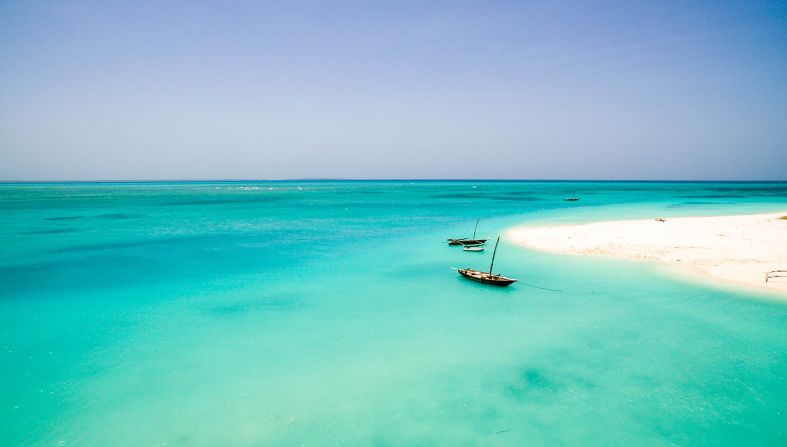<strong>Nungwi Beach: </strong>On Zanzibar's northernmost tip, Nungwi has the kind of white coral sand that seems to glow. Photo courtesy of <a href="index.php?page=&url=https%3A%2F%2Ftheworldpursuit.com%2F" target="_blank" target="_blank">TheWorldPusuit.com</a>