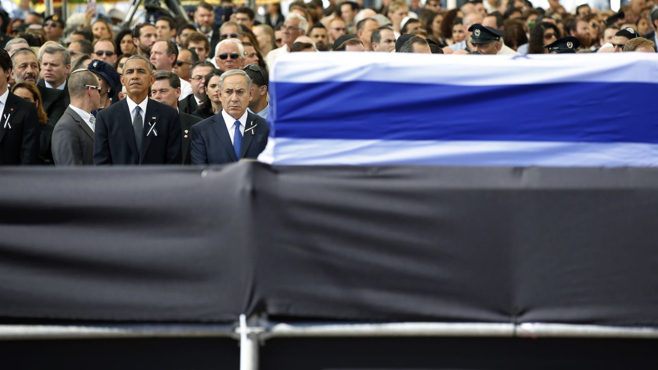 Netanyahu stands next to US President Barack Obama as they attend the funeral of former Israeli President Shimon Peres in September 2016.