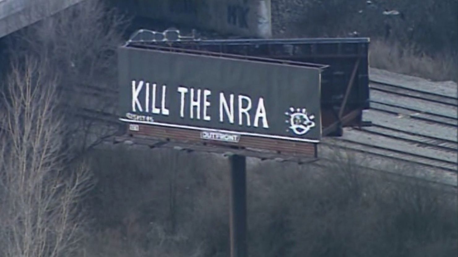 The billboard's owner said the vandals' slogan was replaced with a public service announcement.