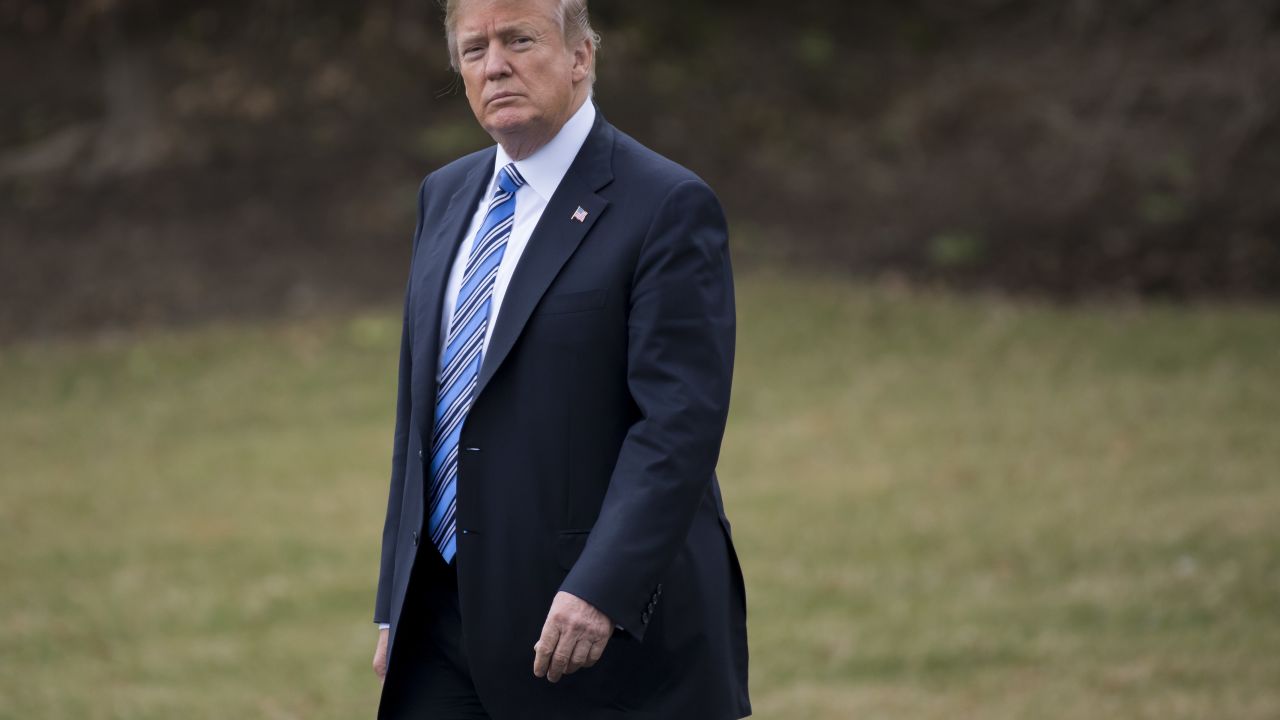 US President Donald Trump walks to Marine One prior to departure from the South Lawn of the White House in Washington, DC, February 16, 2018, as he travels to Florida for the weekend.