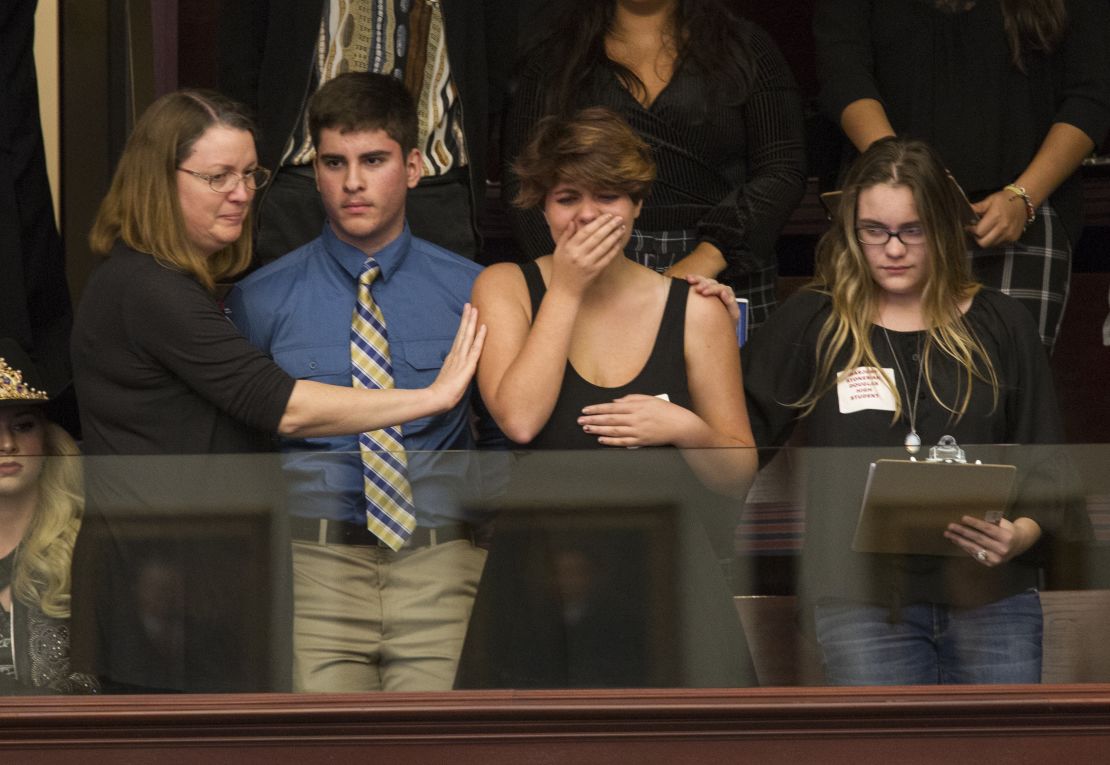 Sheryl Acquaroli, a 16-year-old junior from Marjory Stoneman Douglas High School, is overcome with emotion in the gallery of the House of Representatives after the vote. 