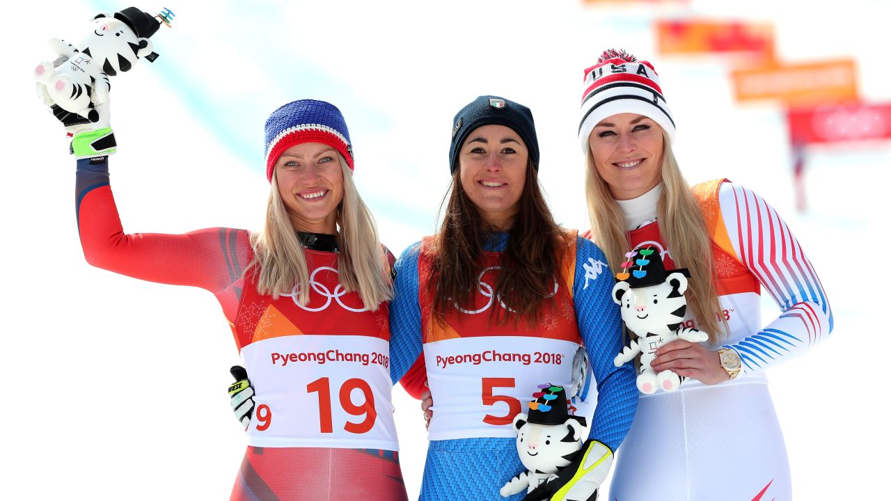 Sofia Goggia (center) celebrates with Ragnhild Mowinckel (left) and Lindsey Vonn (right).