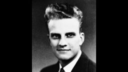 William "Billy" Graham at age 17 on his graduation from Charlotte High School in June 1935. It was before his graduation from high school that Billy had embraced religion at a local revival meeting and had decided on the pulpit rather than the baseball diamond. (AP Photo)