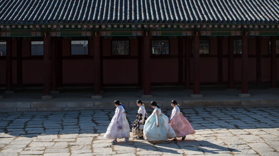 <strong>Seoul: </strong>With the PyeongChang Olympic Winter Games in full swing and the world's eyes on South Korea, tourists wearing traditional Korean hanbok dresses visit Seoul's Gyeongbokgung Palace. 