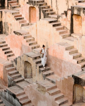 India's impressive ancient stepwells were historically used to descend towards a body of water to collect water for daily use. Stepwells can be found across India, including in Jaipur (above).