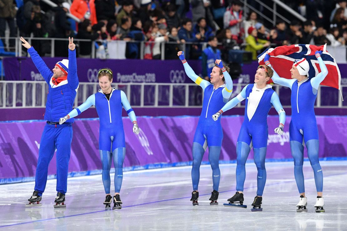 Team Norway celebrate after the men's team pursuit speed skating final.