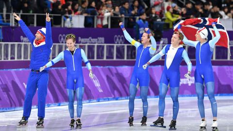 Team Norway celebrate after the men's team pursuit speed skating final.