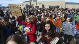 Students at Mayo High School stage a walkout against gun violence for 17 minutes during the school day Wednesday, Feb. 21, 2018, in Rochester, Minn. The 17 minutes were in memory of the 17 victims in the Marjory Stoneman Douglas High School shooting in Parkland, Fla., on Feb. 14. 