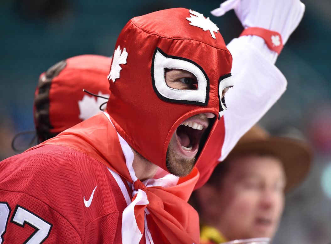 A Canadian fan cheers on the women's hockey team during the gold-medal game against the United States.