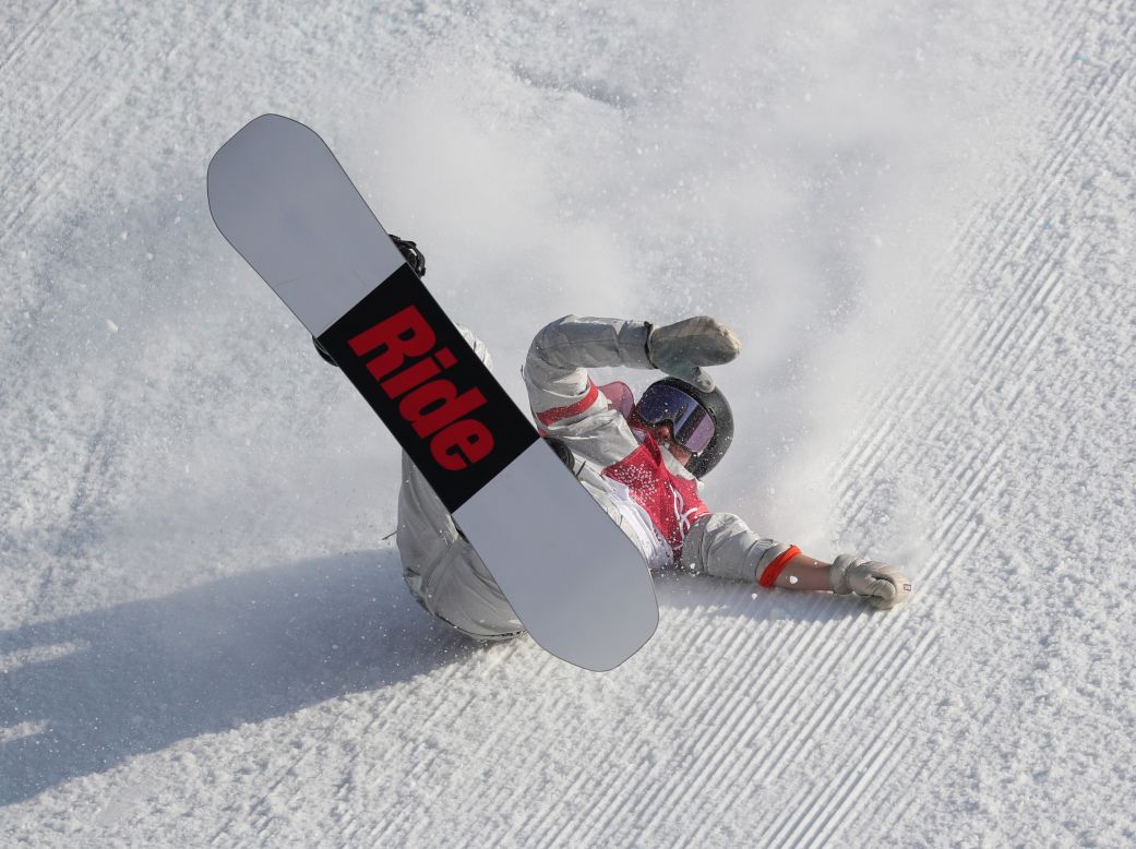American snowboarder Jessika Jenson falls in the big-air event.