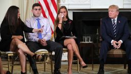 WASHINGTON, DC - FEBRUARY 21:  (AFP OUT) U.S. President Donald Trump (R)  hosts a listening session with Marjory Stoneman Douglas High School shooting survivors Julie Cordover (2nd R) and  Jonathan Blank and his mother Melissa Blank and others in the State Dining Room at the White House February 21, 2018 in Washington, DC. Trump is hosted the session in the wake of last week's mass shooting at the high school in Parkland, Florida, that left 17 students and teachers dead.  (Photo by Chip Somodevilla/Getty Images)