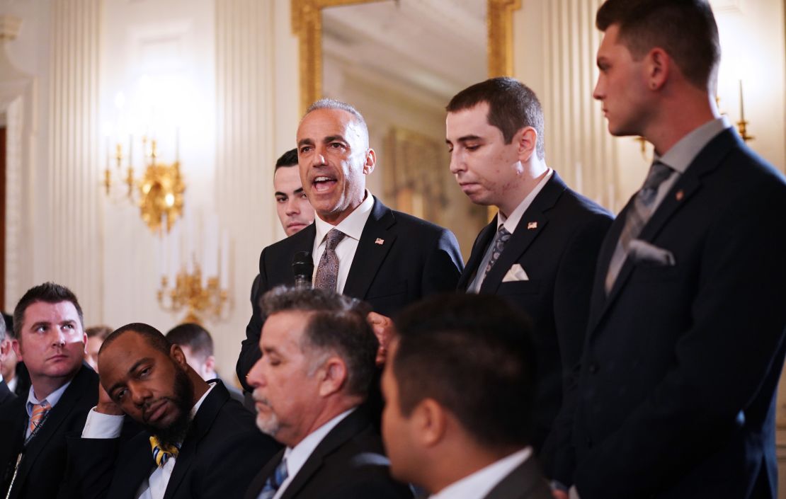 Pollack (center), flanked by his sons, speaks during a listening session on gun violence at the White House in 2018. 
(MANDEL NGAN/AFP/Getty Images)