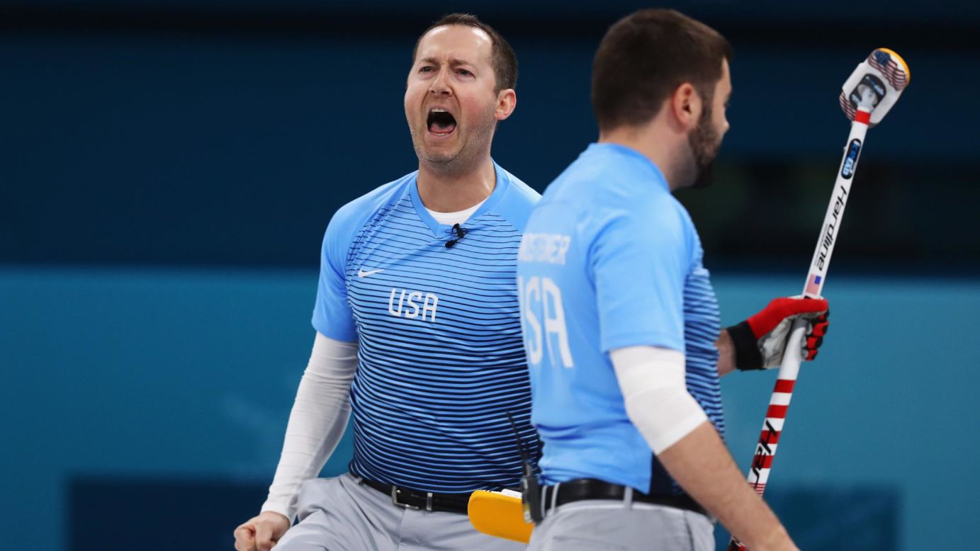 American Tyler George celebrates victory after a 5-3 upset over Canada in the seminfinals of the men's curling event. The US men's curling team will face Sweden in the final.