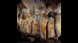 La Pasiega, section C. Cave wall with paintings. The scalariform (ladder shape) composed of red horizontal and vertical lines (centre left) dates to older than 64,000 years and was made by Neanderthals. 