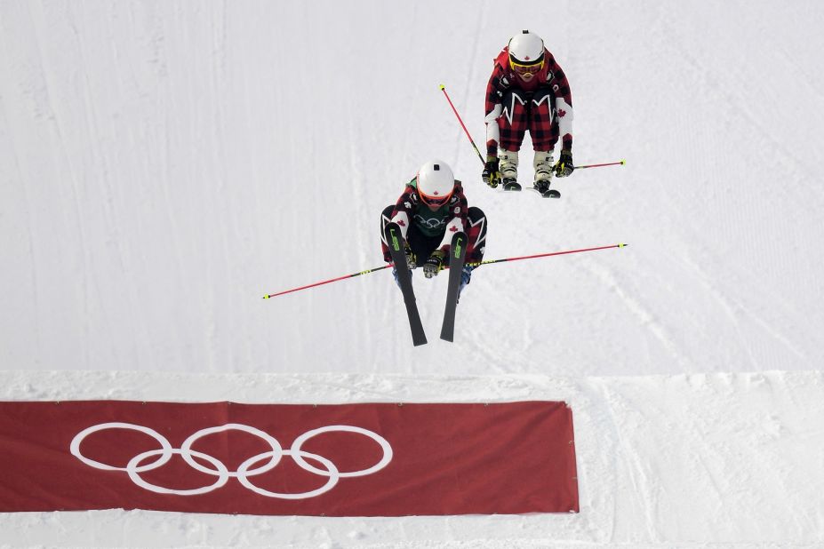 Phelan, left, and Serwa compete in the ski cross final.