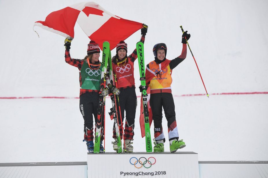 From left, Canadians Brittany Phelan and Kelsey Serwa celebrate on the podium with Switzerland's Fanny Smith. Serwa had just won gold in the ski cross. Phelan won the silver, and Smith finished with the bronze.