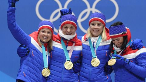 Norway's gold medallists Ingvild Flugstad Oestberg, Astrid Uhrenholdt Jacobsen, Ragnhild Haga and Marit Bjeorgen pose on the podium after the cross country women's 4x5km relay at the Pyeongchang.