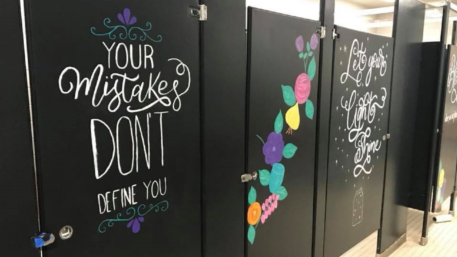 Parents painted bathroom stalls to reflect a Texas school's positive learning environment.