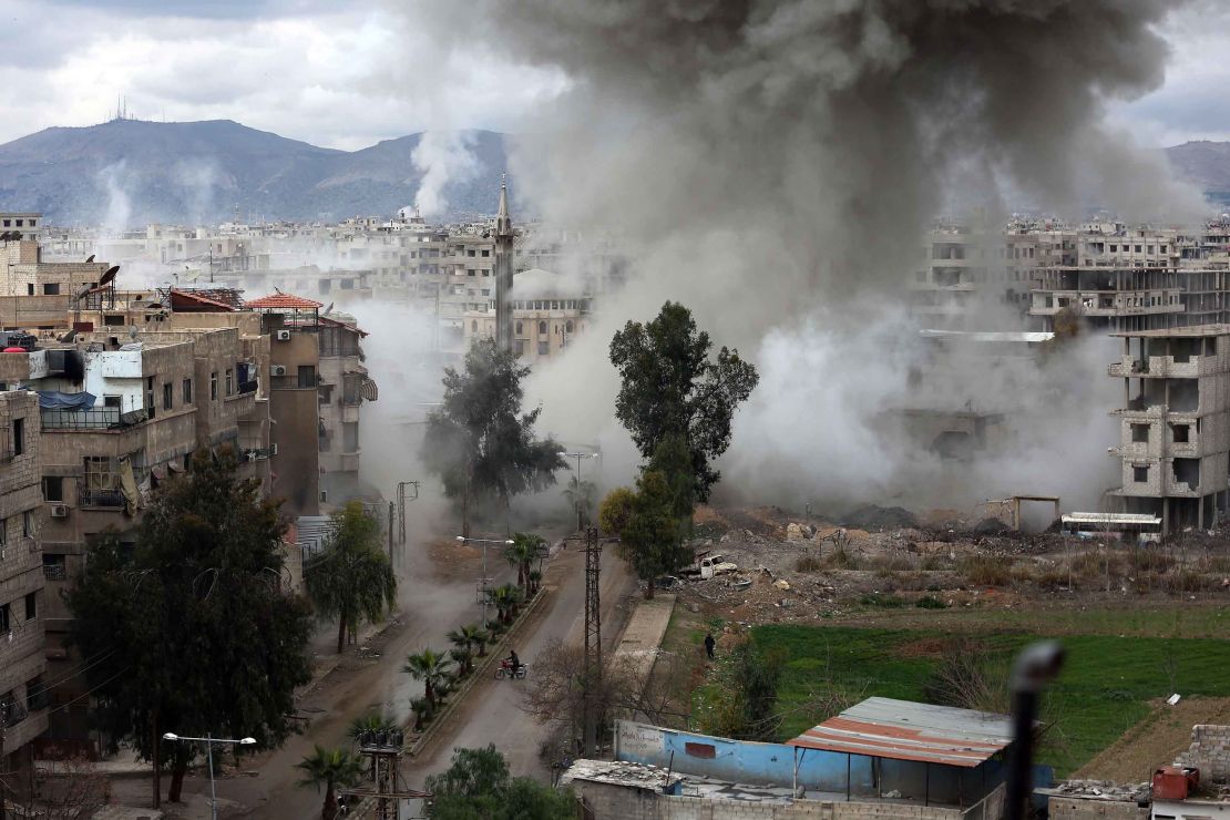 Smoke billows following Syrian government bombardments on Kafr Batna, in the besieged region of Eastern Ghouta.