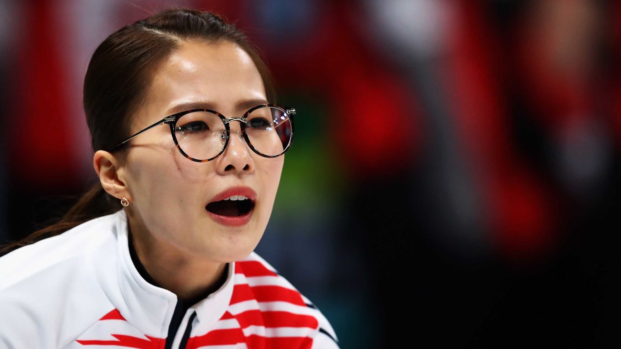 Kim Eun-jung of South Korea competes during the women's curling event.