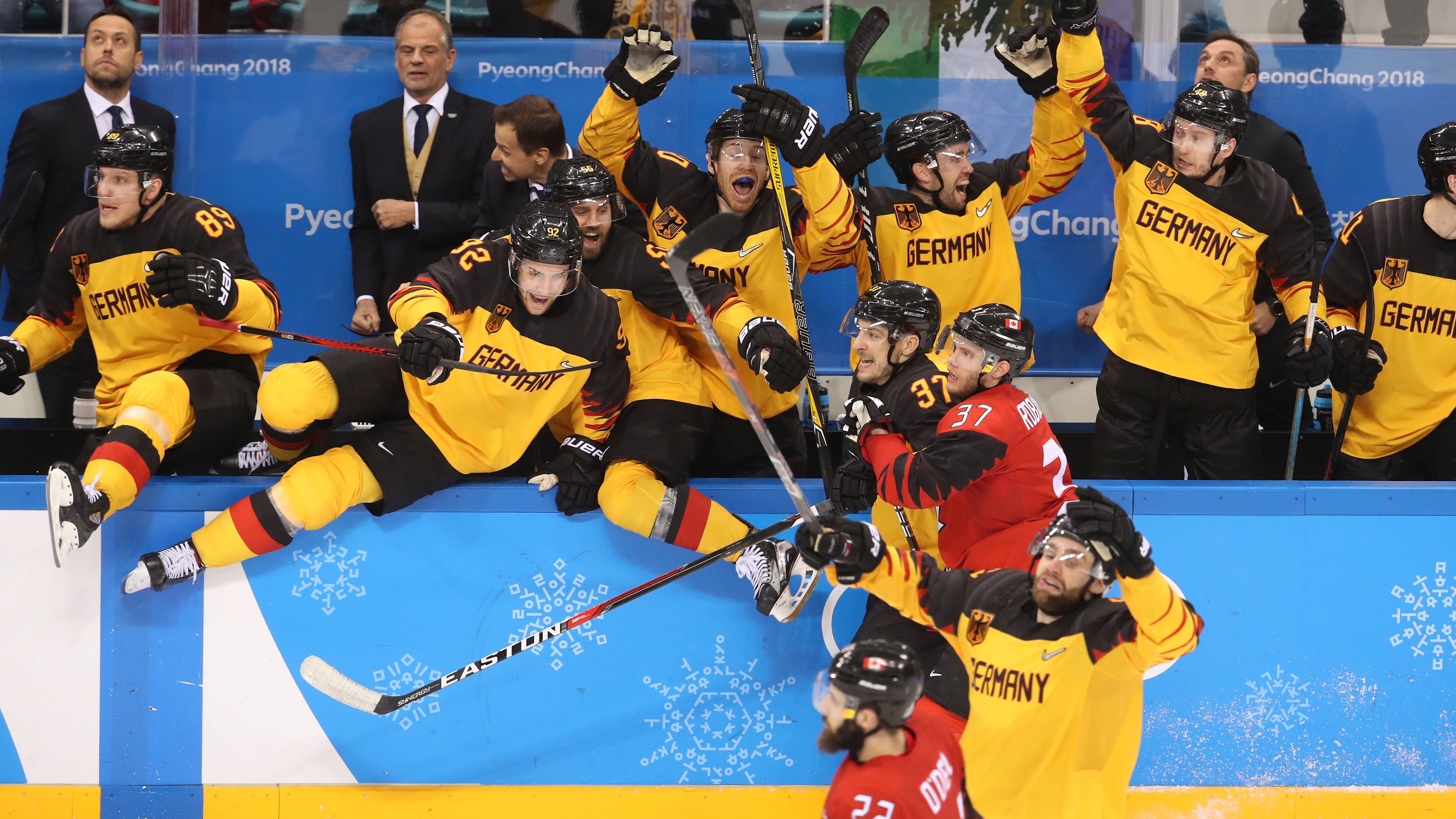 Germany celebrate defeating Canada 4-3 in the semifinals 