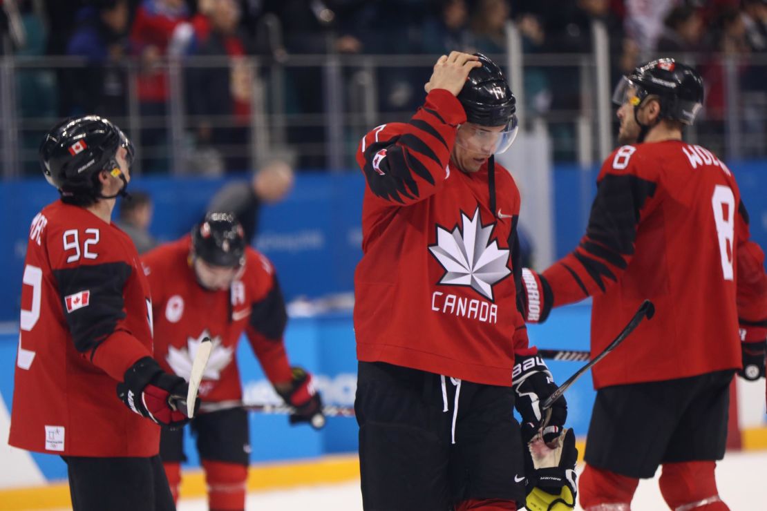 Canada players react after losing 4-3 to Germany during the ice hockey semifinals at PyeongChang 2018.
