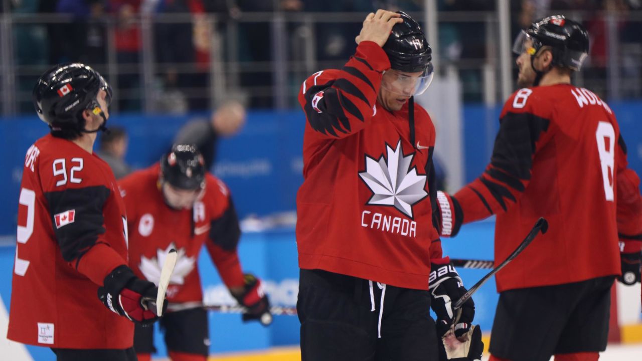 Canada players react after losing 4-3 to Germany during the ice hockey semifinals at PyeongChang 2018.