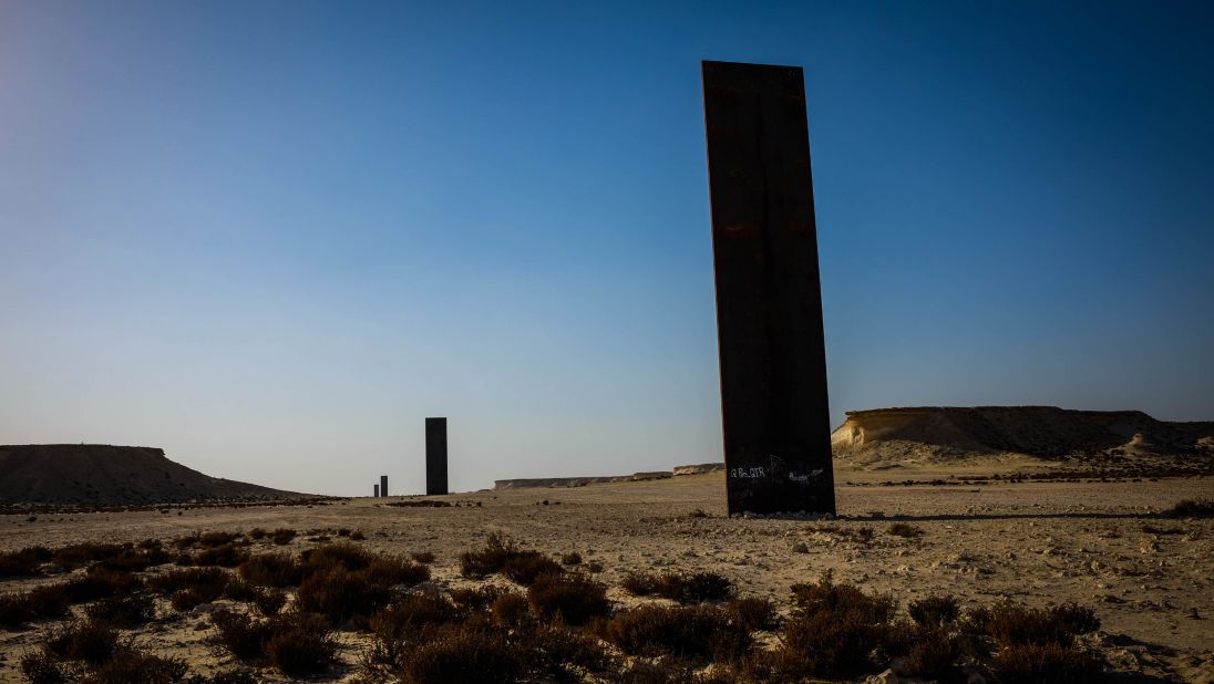 <strong>Strange things in the desert:</strong> In western Qatar, strange metallic monoliths loom over the desert.
