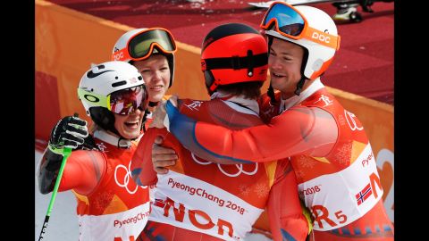 Norwegian skiers celebrate winning bronze in the team event. It was Norway's 38th medal of these Olympics, which breaks the record for most medals won by one country during a single Winter Games.