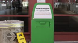 A green marijuana "amnesty box" sits outside an entrance at McCarran International Airport in Las Vegas.