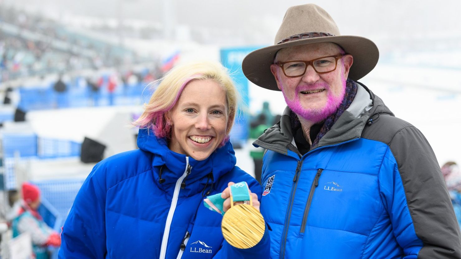 Tom Kelly has three times lost a bet and had his hair dyed pink to honor a US medalist.