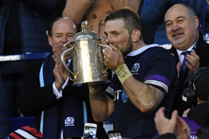 Scotland's flanker John Barclay kisses the Calcutta Cup after <a href="index.php?page=&url=http%3A%2F%2Fcoredev-dam-cnn.expprod.services.ec2.dmtio.net%3A8080%2Fdam%2Fassets%2F180226103040-stade-velodrome-six-nations-story-top.jpg" target="_blank" target="_blank">his side's 25-13 victory over England</a> at Murrayfield, Edinburgh. It was the first time Scotland has beaten its oldest rival in ten years.