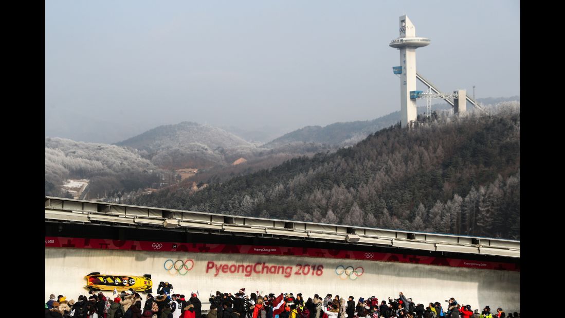 The bobsled piloted by Germany's Nico Walther makes its way down the track. Walther's team finished in a tie for silver.