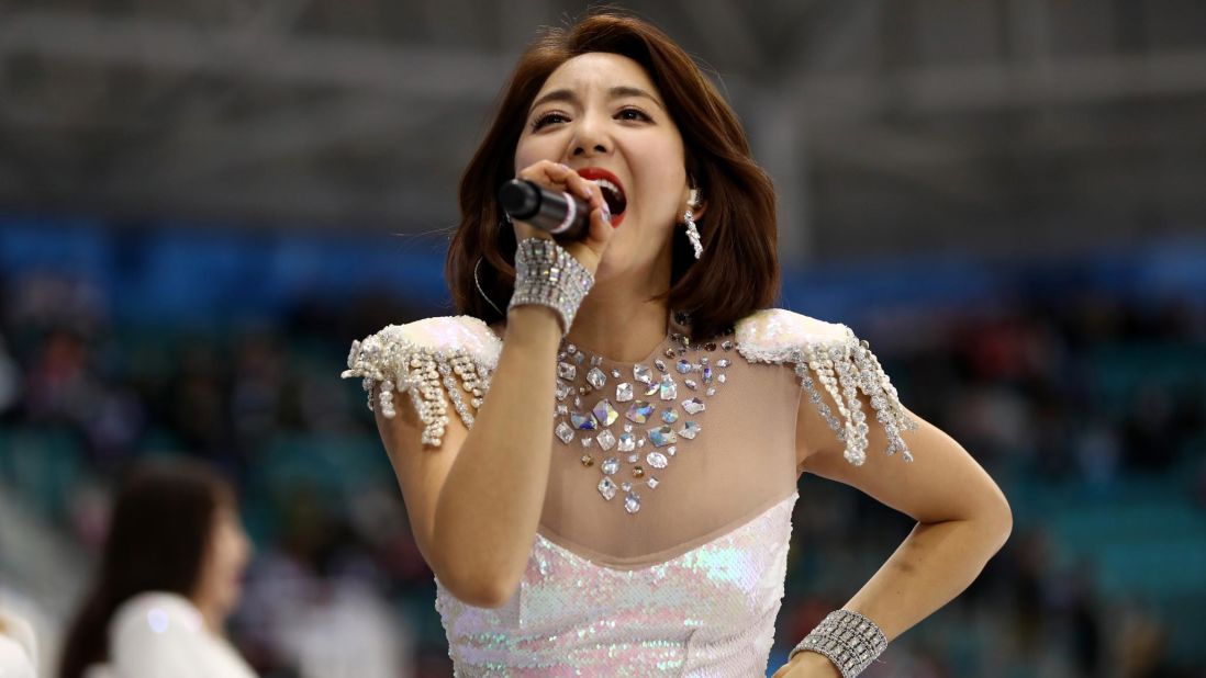 Singer Bada performs at the gold-medal hockey game.