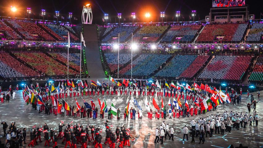 Flagbearers arrive during the closing ceremony of the Pyeongchang 2018 Winter Olympic Games at the Pyeongchang Stadium on February 25, 2018. / AFP PHOTO / Christof STACHE        (Photo credit should read CHRISTOF STACHE/AFP/Getty Images)