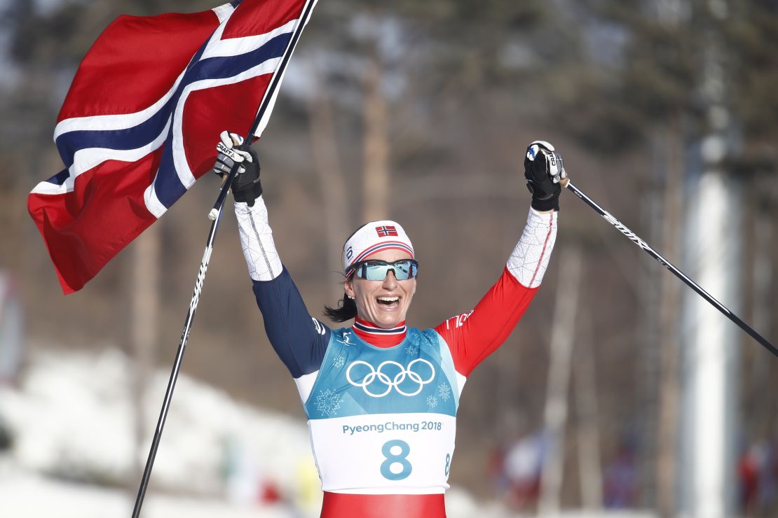 Norway's Marit Bjoergen celebrates after winning the women's 30km cross country mass start.