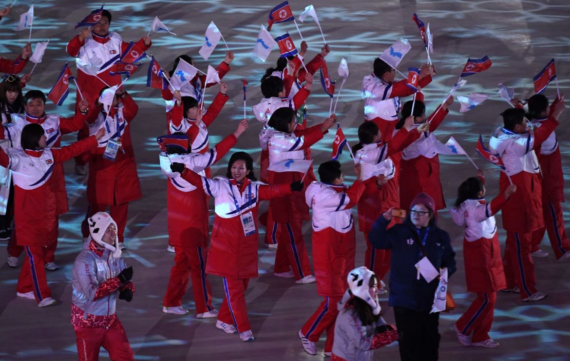 The unified Korean team enter the stadium.