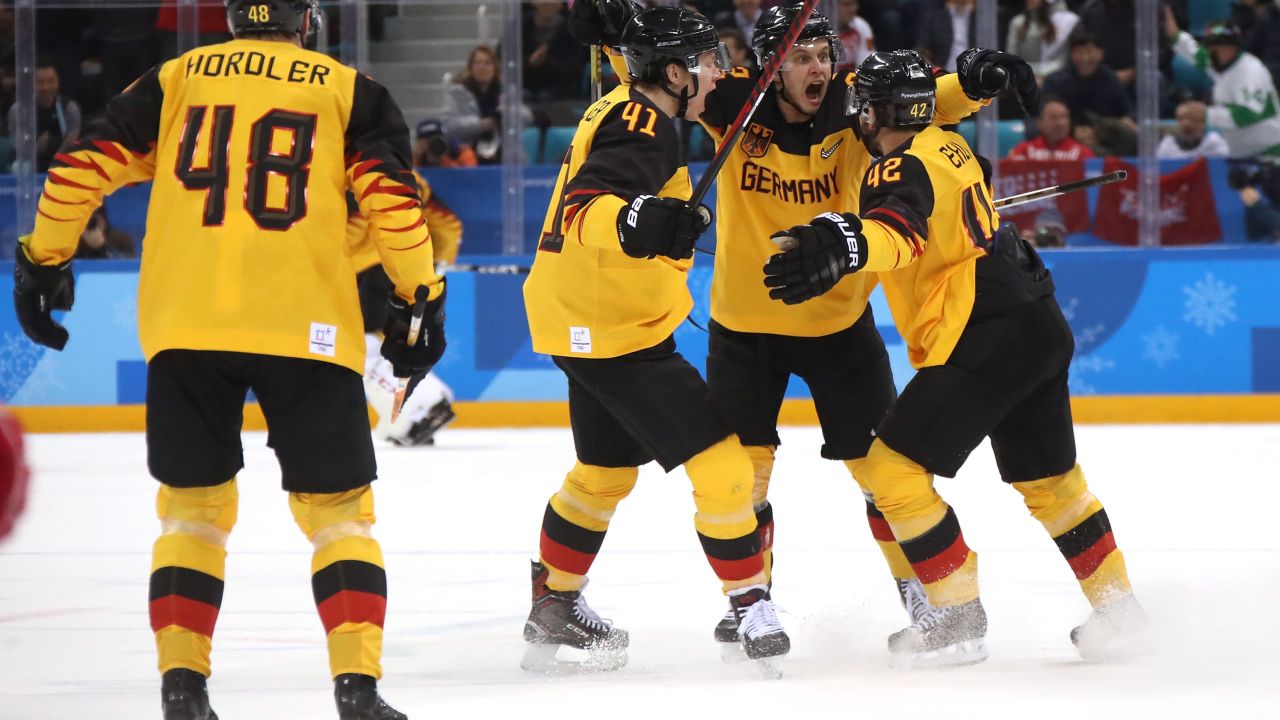 The German ice hockey team in action during the gold medal match.  