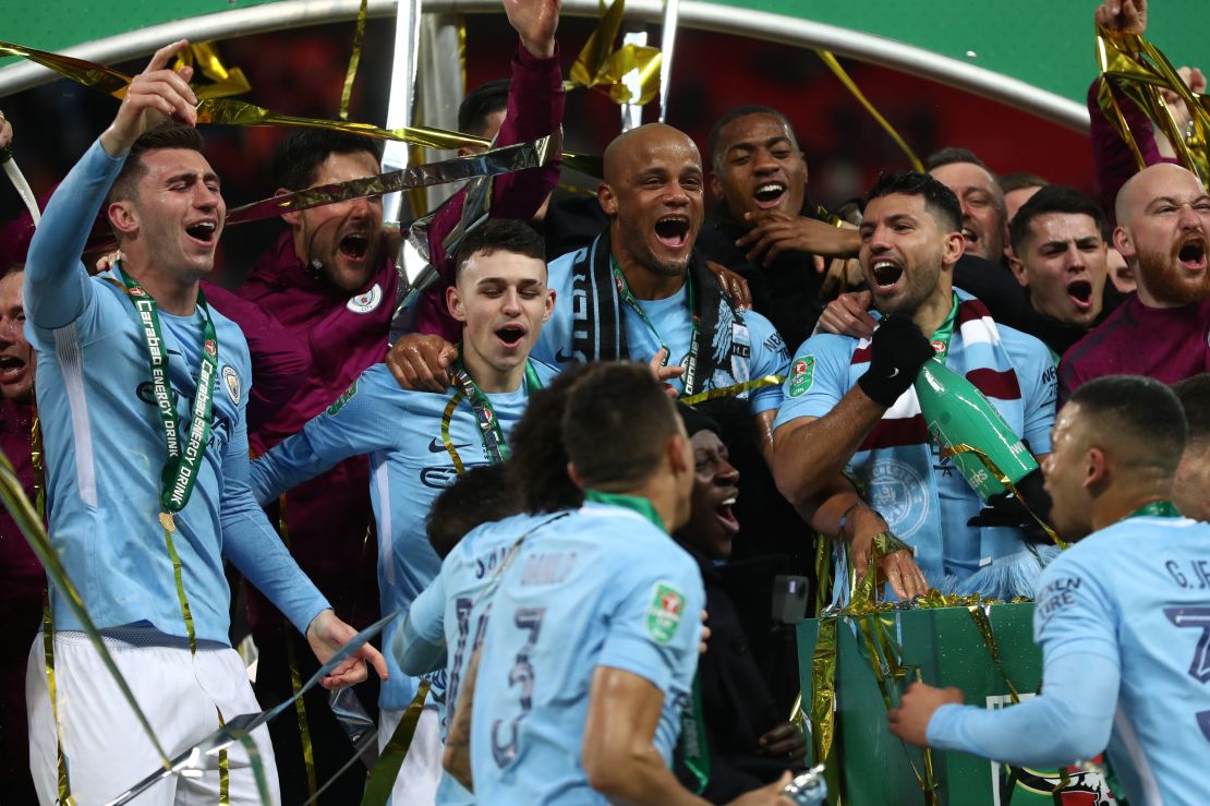 Manchester City celebrate after winning the Carabao Cup Final 3-0 against Arsenal at Wembley Stadium.