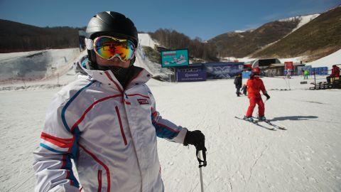 Skiers in Zhangjiakou, several hours drive northwest of Beijing, enjoy the clear runs during a sunny weekend.