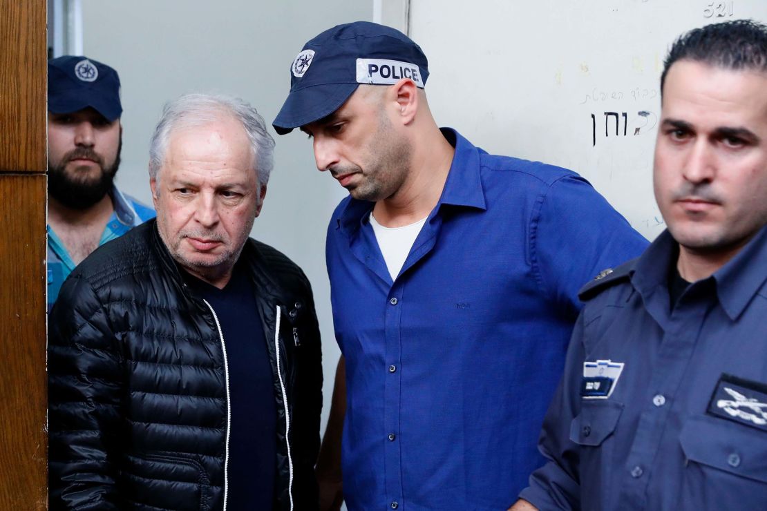 Israeli tycoon Shaul Elovitch (2nd L) appears at the Justice Court in Tel Aviv on February 22.